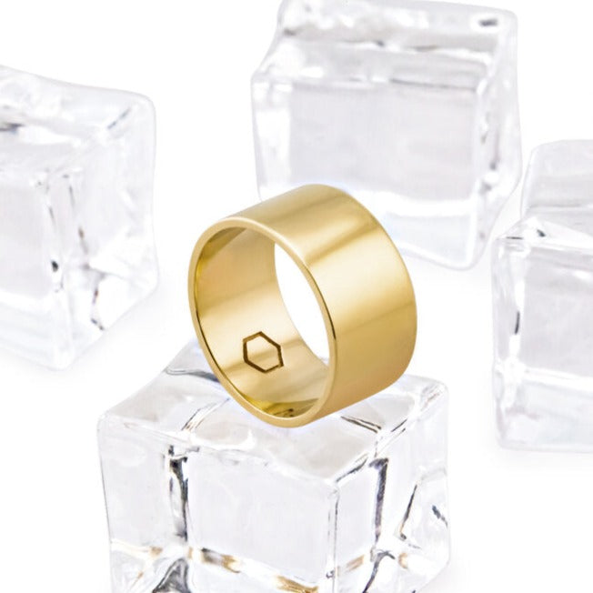 This Cyclical Thick Ring provides a solid circular design which is both simple and sophisticated. Our thick ring in yellow gold is a classic band style. It is the perfect piece for stacking. Layer with the cyclical thin ring to complete the look.