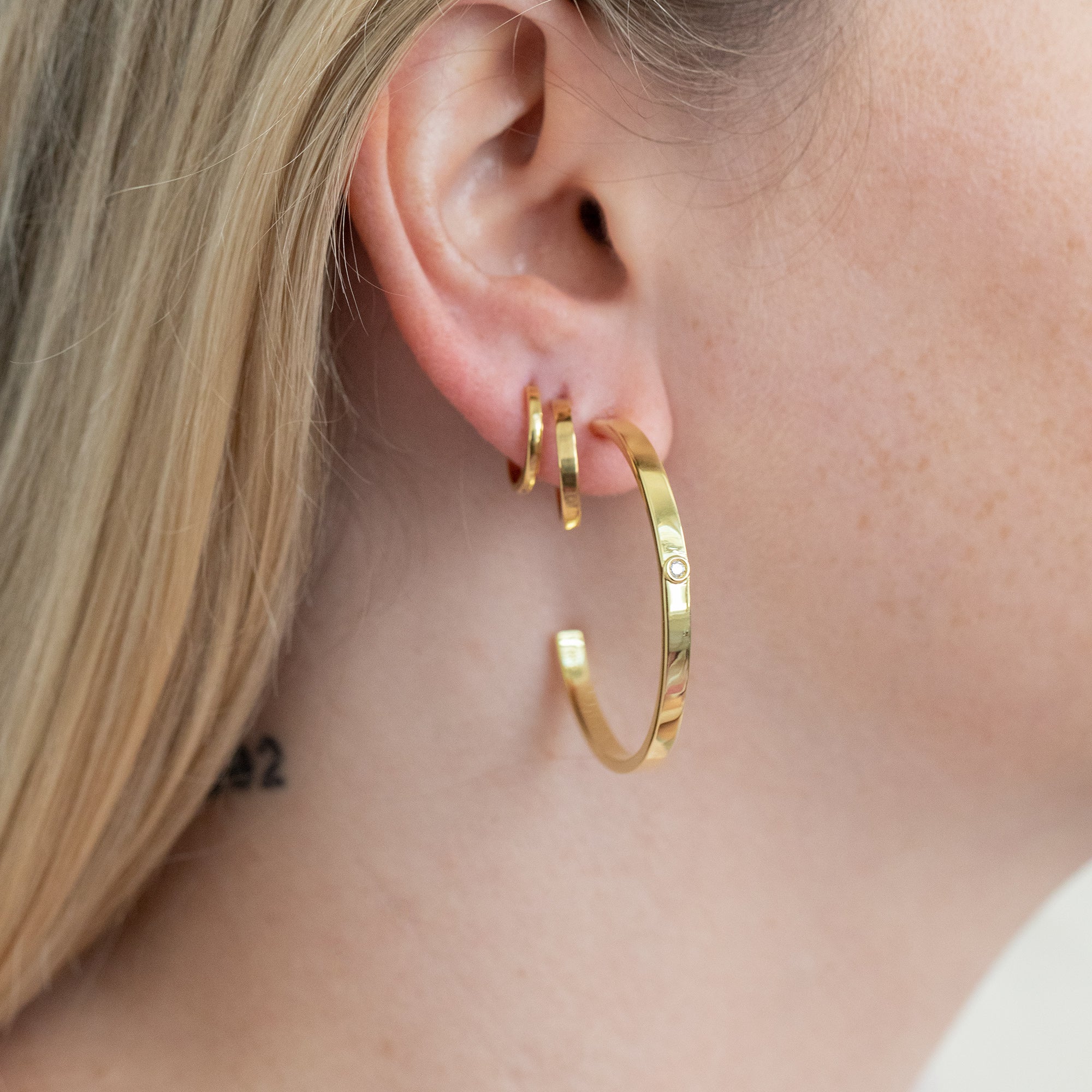 Crafted with beautiful lab-grown diamonds, these earrings add a touch of sophistication to any outfit. Get the luxurious sparkle of diamonds without the ethical and environmental concerns that come with mined diamonds. It is the perfect pair for curating the ear. Wear with the small hoops and huggie hoops to complete the look.