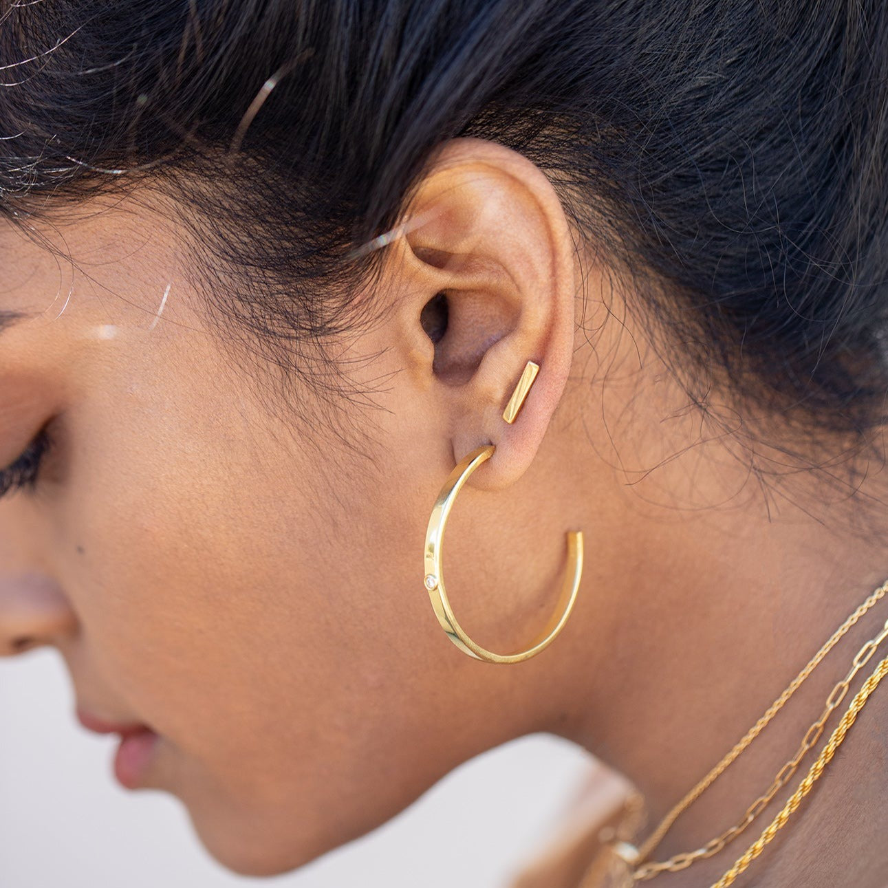 Flex Stud earrings are designed to add a stylish and modern touch to any wardrobe. These earrings are perfect for daily wear. Move them around on the ear to create your own unique style. Enhance your look with these stylish, fashionable accessories. Pair with the Flex Necklace to complete the look.