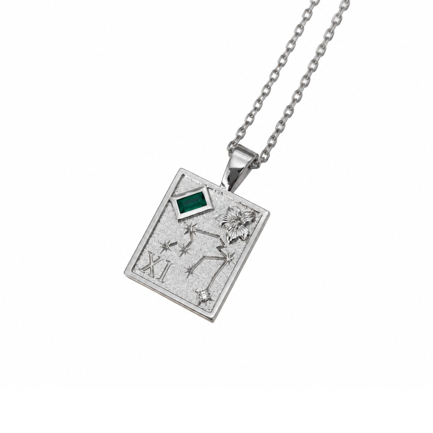 A silver-toned pendant necklace featuring the Cancer zodiac sign with a small green rectangular gemstone, shown on a clean white background.