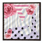 A square silk scarf featuring a modern abstract pattern with pink watercolor roses, pink and white stripes, lavender polka dots, and gray wavy lines, finished with a dark brown border.
