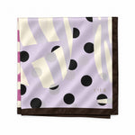 A folded square silk scarf with an abstract pattern featuring black polka dots, cream-colored wavy stripes, and a lavender-purple background, finished with a dark brown border. CIER logo printed on the bottom right.