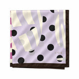 A folded square silk scarf with an abstract pattern featuring black polka dots, cream-colored wavy stripes, and a lavender-purple background, finished with a dark brown border. CIER logo printed on the bottom right.