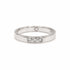 Slim silver ring with three lab-grown diamonds bezel set, displayed on a white background.