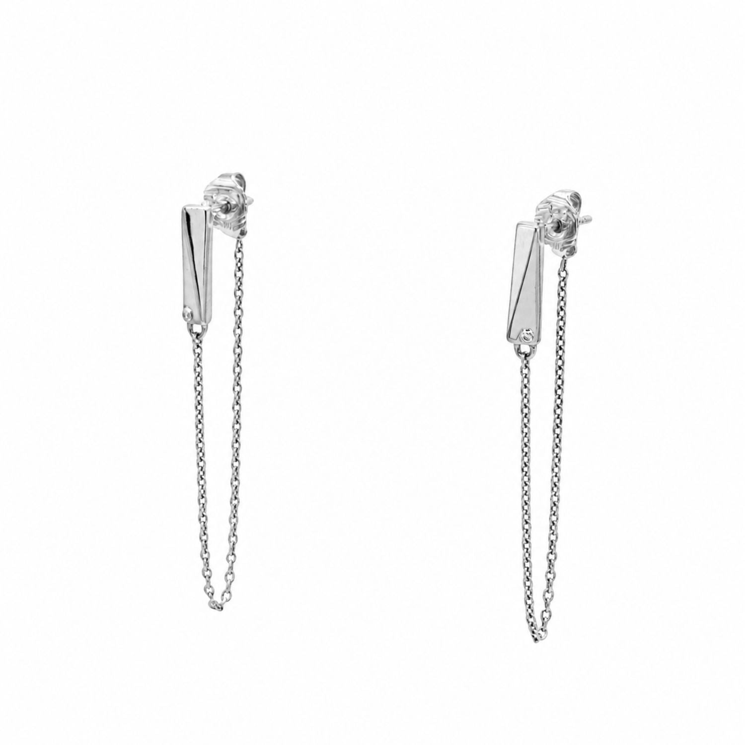 A pair of sterling silver earrings with a chain attached to a stud and butterfly back, featuring round lab grown diamonds.