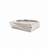 A silver geometric ring with a small square clear gemstone, shown on a plain white background.
