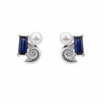 Sterling silver stud earrings with a blue sapphire, shell, lab-grown diamond and pearl on a white background.