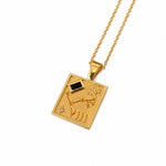 A gold pendant necklace featuring a square celestial design with Roman numeral VIII, a constellation motif, and a small black rectangular accent, shown on a white background.