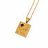 A gold pendant necklace featuring a square celestial design with Roman numeral VIII, a constellation motif, and a small black rectangular accent, shown on a white background.