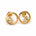A pair of gold circular stud earrings with baguette and pear-cut lab-grown diamonds, shown on a clean white background.