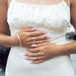 This sophisticated sterling silver bangle from our Cyclical collection is the perfect way to add a timeless flair to any look. Its classic design features a timeless silhouette that pairs effortlessly with a variety of styles. Wear with the cyclical thick or thin ring to complete the look. 