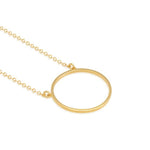 A 14K gold plated circular necklace on a white background shot in studio.