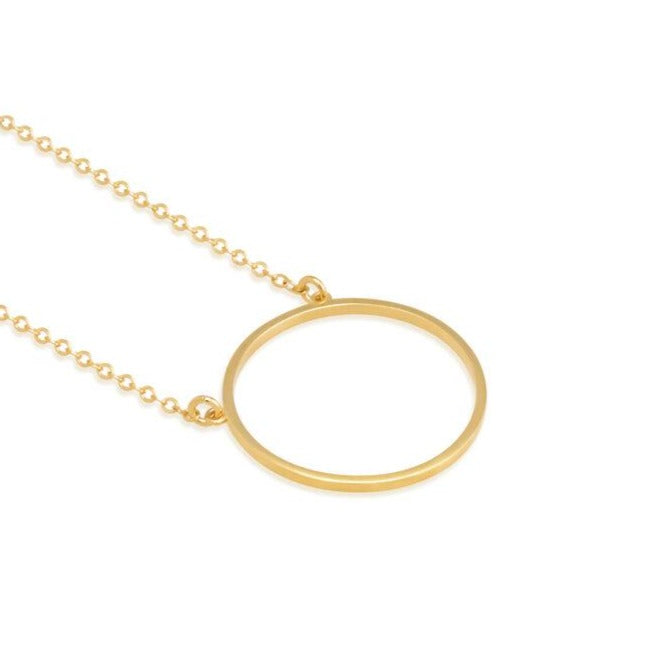 A 14K gold plated circular necklace on a white background shot in studio.
