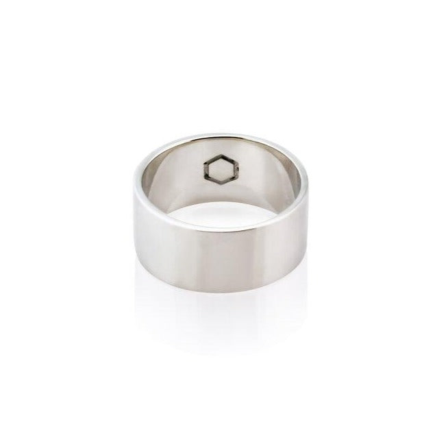 A cyclical thick ring made of sterling silver with a hexagonal center embellishment, displayed on a white background.