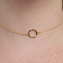 Look your best with this Cyclical Choker Necklace with Lab Grown Diamond. The necklace features a simple, elegant design with a lab-grown diamond for a touch of luxury. The lab-grown diamond is conflict-free, making it an environmentally-friendly choice. Wear this necklace with everything from casual outfits to formal wear for a stunning look. Layer with the rope chain necklace to complete the look. 