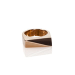 Rectangular rose gold ring, on a plain white background. 